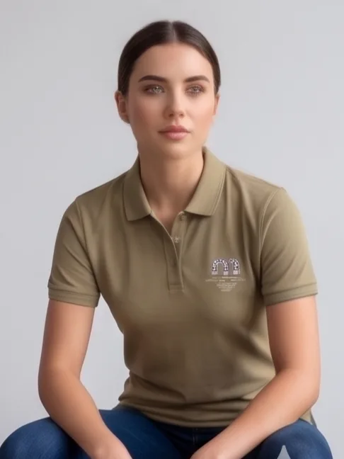 Arch Crest Polo (Sage Edition) - Women Seated Editorial Angle